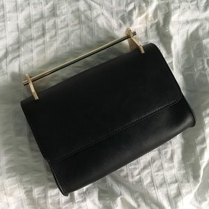 Gold handle clutch